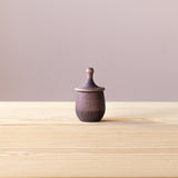 Grapat Wunschbox "Little Things" in lila, eine kleine Holzdose mit Deckel zum Kreiseln.